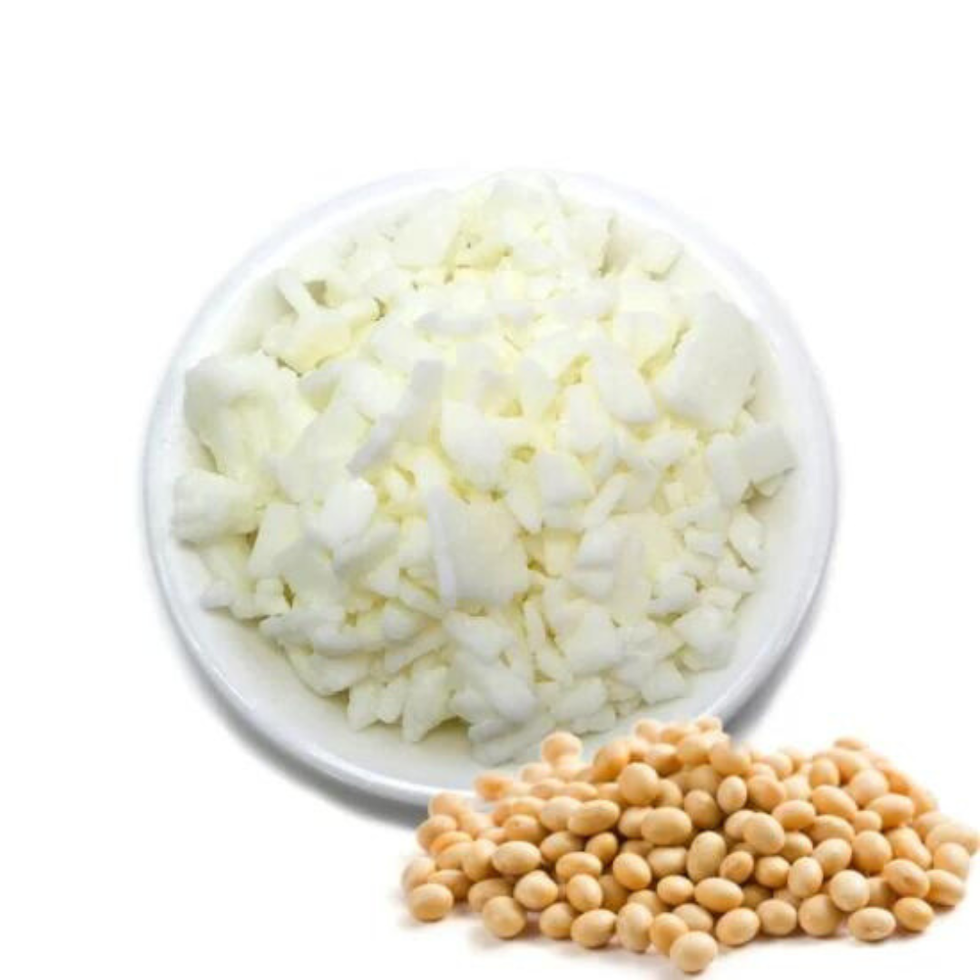 Natural soy wax flakes and soybeans for candle making.